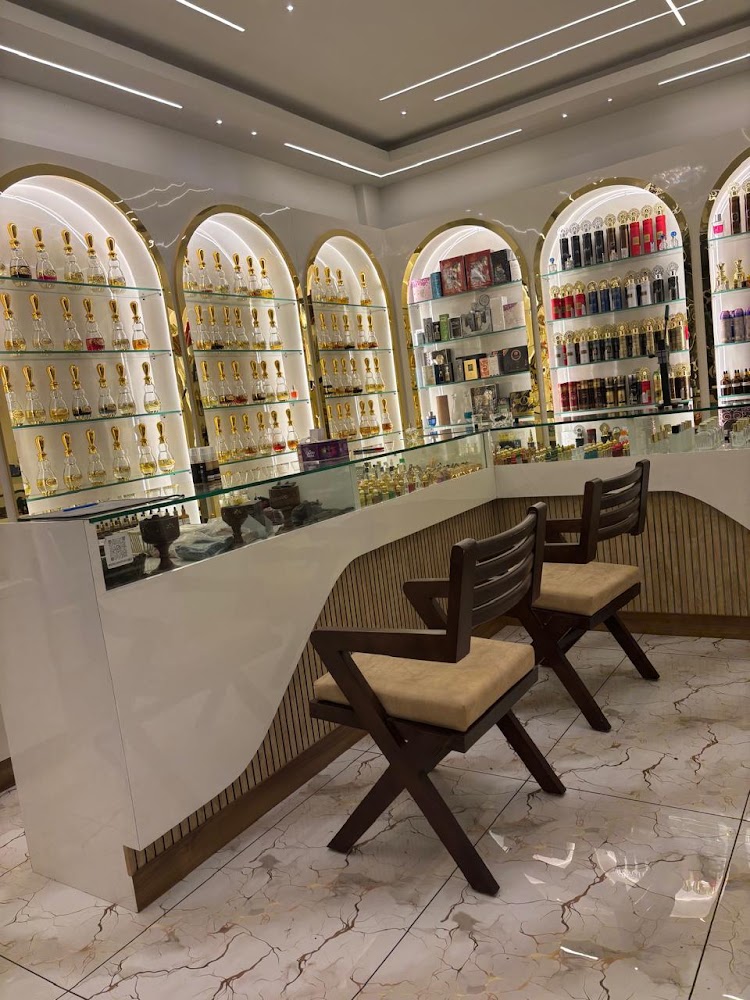 Perfume testing counter and arched displays inside the boutique